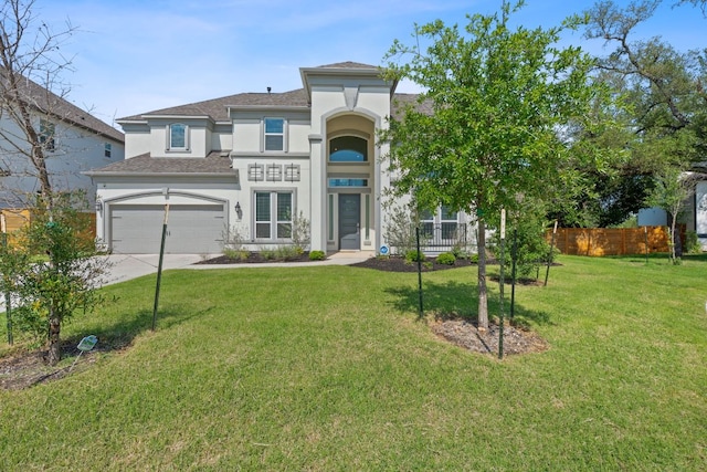 1616 Illawarra Way, Leander, TX 78641 - view of front of home with stucco siding, driveway, a shingled roof, and an attached garage