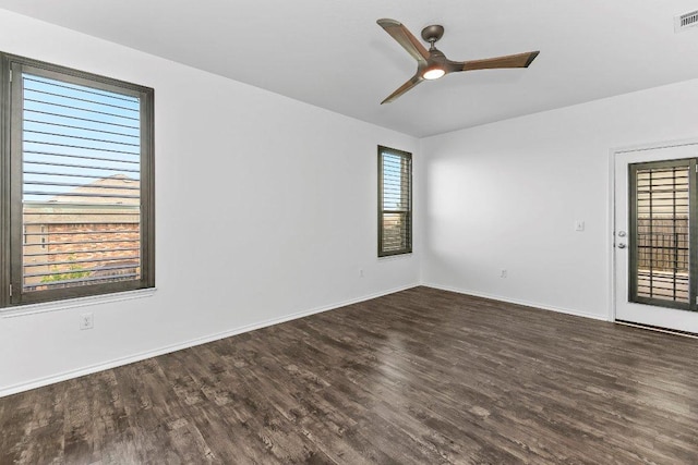 7604 Nunsland Dr, Austin, TX 78744 - spare room with wood finished floors, baseboards, and ceiling fan