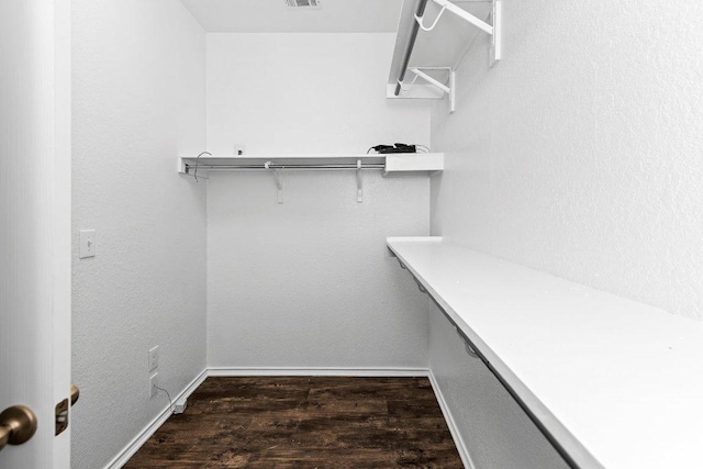 7604 Nunsland Dr, Austin, TX 78744 - spacious closet featuring wood finished floors