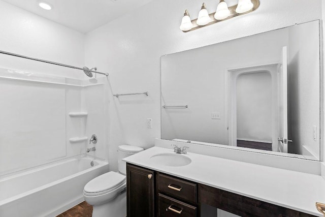 7604 Nunsland Dr, Austin, TX 78744 - bathroom with toilet, vanity, shower / washtub combination, and wood finished floors