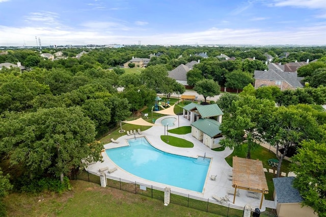 drone / aerial view of a pool