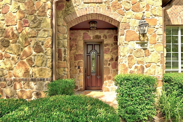 1607 Mesa Verde Dr, Round Rock, TX 78681 - doorway to property featuring stone siding and brick siding
