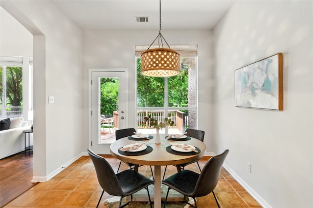 1607 Mesa Verde Dr, Round Rock, TX 78681 - dining room with light tile patterned floors and baseboards