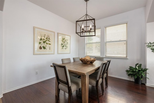 361 Stone View Trl, Austin, TX 78737 - dining room with a chandelier, dark wood-type flooring, and baseboards