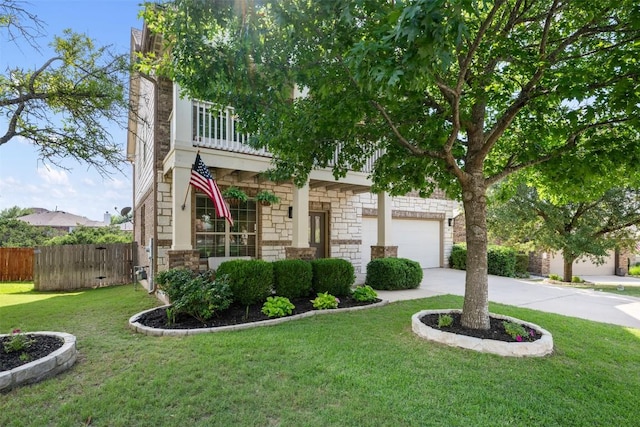 361 Stone View Trl, Austin, TX 78737 - view of property hidden behind natural elements featuring stone siding, driveway, a garage, and a balcony