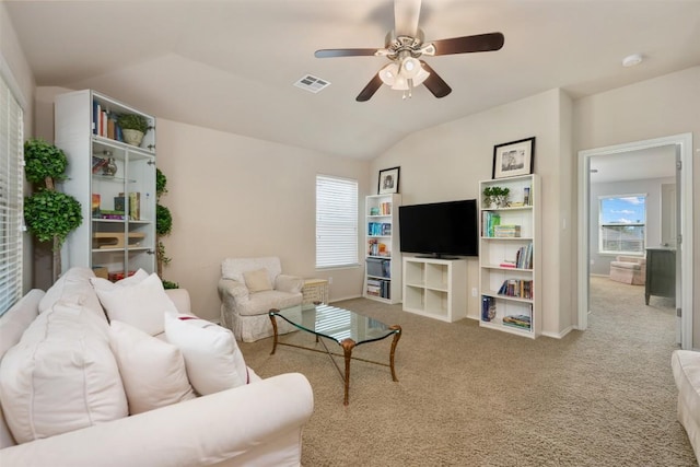 361 Stone View Trl, Austin, TX 78737 - carpeted living area featuring a ceiling fan, lofted ceiling, and baseboards