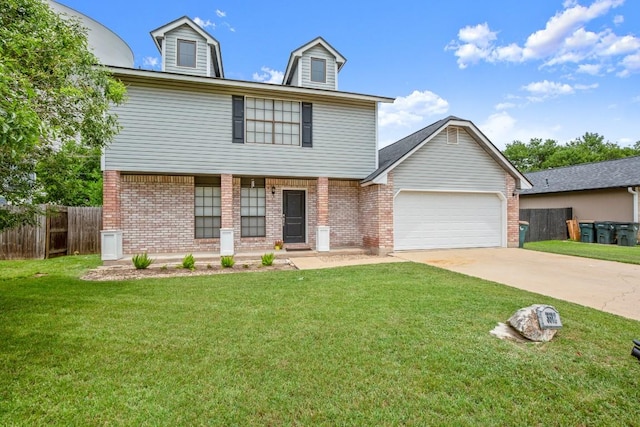 3312 Monument Dr, Round Rock, TX 78681 - view of front facade with brick siding, a garage, and driveway