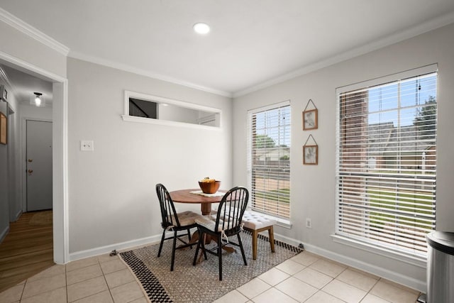 3312 Monument Dr, Round Rock, TX 78681 - dining area featuring ornamental molding, light tile patterned floors, and baseboards