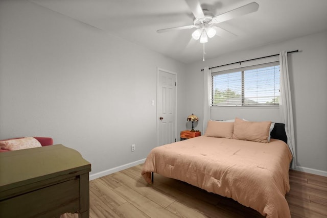 3312 Monument Dr, Round Rock, TX 78681 - bedroom with light wood-type flooring, baseboards, and a ceiling fan