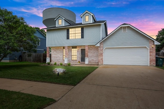 3312 Monument Dr, Round Rock, TX 78681 - view of front of property with concrete driveway, brick siding, and an attached garage