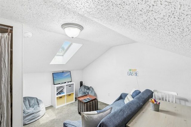 bonus room with a skylight, vaulted ceiling, carpet floors, a textured ceiling, and baseboards
