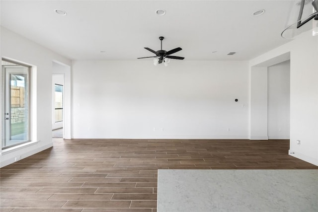 639 Bay Breeze Dr, Kyle, TX 78640 - spare room featuring wood finished floors, ceiling fan, and recessed lighting
