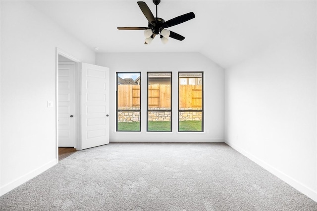 639 Bay Breeze Dr, Kyle, TX 78640 - carpeted empty room with baseboards, ceiling fan, and vaulted ceiling