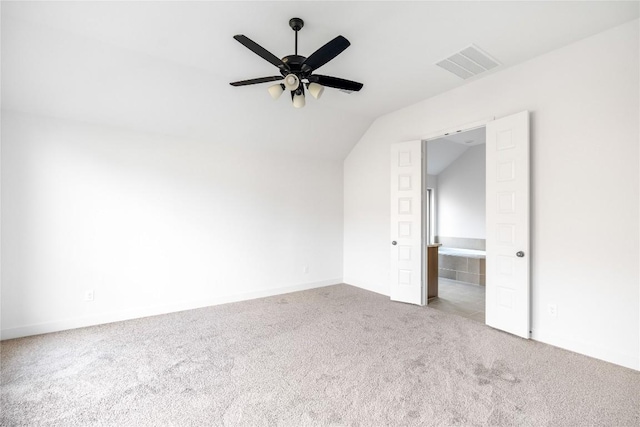 639 Bay Breeze Dr, Kyle, TX 78640 - unfurnished bedroom featuring vaulted ceiling, carpet flooring, and ceiling fan