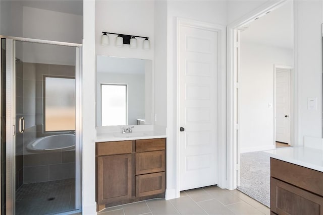 639 Bay Breeze Dr, Kyle, TX 78640 - full bathroom with vanity, a stall shower, and tile patterned floors