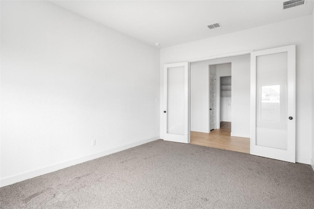 639 Bay Breeze Dr, Kyle, TX 78640 - unfurnished bedroom with carpet and baseboards