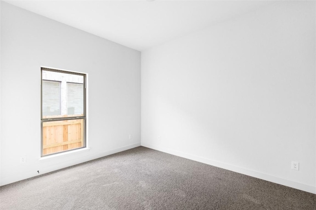 639 Bay Breeze Dr, Kyle, TX 78640 - carpeted empty room featuring baseboards