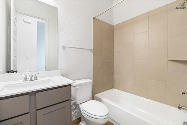 639 Bay Breeze Dr, Kyle, TX 78640 - full bathroom with toilet, a textured wall, shower / bathtub combination, and vanity
