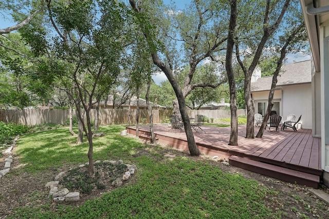 view of yard with a deck