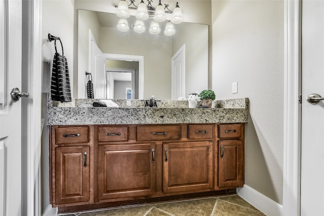 710 Breezeway Ln, Georgetown, TX 78633 - bathroom with vanity and baseboards