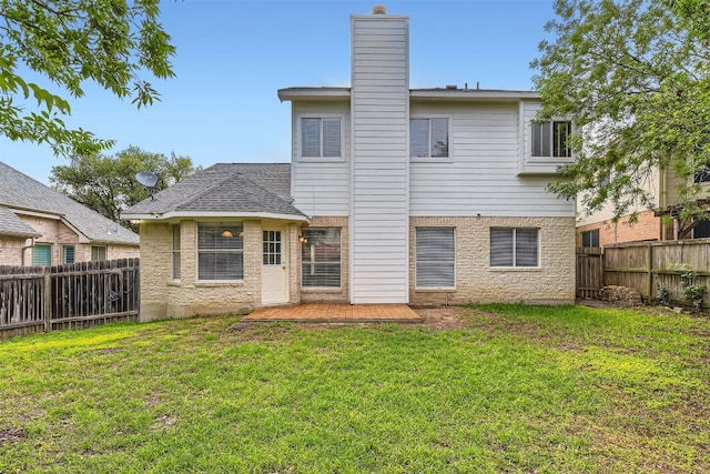 17904 Worley Dr, Pflugerville, TX 78660 - rear view of house with a chimney