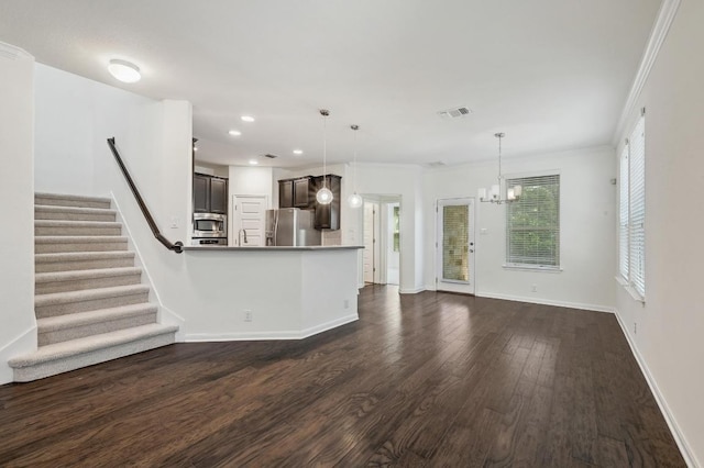 503 S Meadowlark St Unit B, Lakeway, TX 78734 - unfurnished living room featuring dark wood finished floors, stairway, a chandelier, baseboards, and recessed lighting