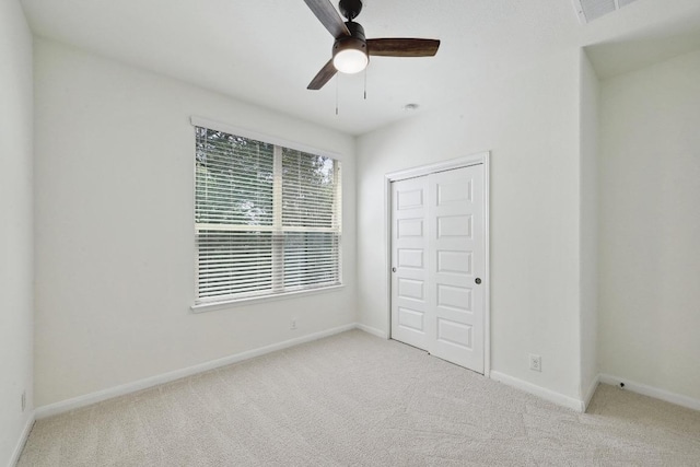 503 S Meadowlark St Unit B, Lakeway, TX 78734 - unfurnished bedroom with carpet, baseboards, and a closet