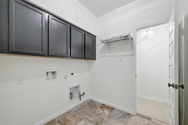 503 S Meadowlark St Unit B, Lakeway, TX 78734 - washroom featuring hookup for a gas dryer, hookup for an electric dryer, cabinet space, and baseboards