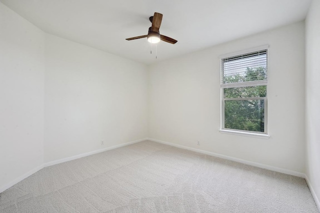 503 S Meadowlark St Unit B, Lakeway, TX 78734 - unfurnished room with light carpet, baseboards, and ceiling fan