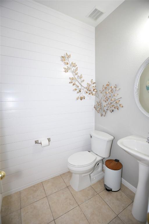 1401 Brixey Cv, Austin, TX 78754 - half bath with toilet and tile patterned flooring
