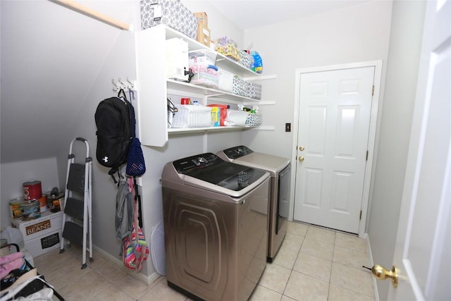 1401 Brixey Cv, Austin, TX 78754 - laundry area featuring washer and clothes dryer and light tile patterned floors