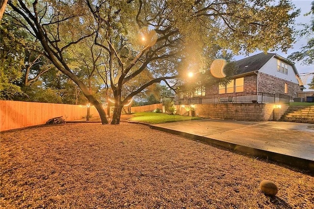 1401 Brixey Cv, Austin, TX 78754 - fenced backyard featuring a wooden deck