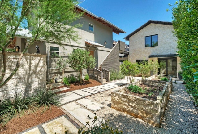 2309 S 4th St, Austin, TX 78704 - view of yard featuring a garden and fence
