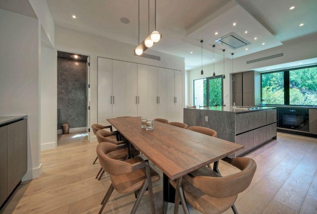 2309 S 4th St, Austin, TX 78704 - dining space with light wood-style flooring, recessed lighting, and baseboards