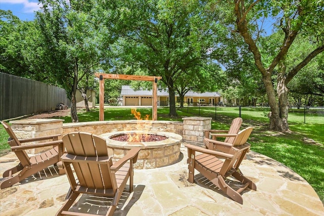 3301 Arrowhead Cir, Round Rock, TX 78681 - view of patio with an outdoor fire pit and an outdoor structure