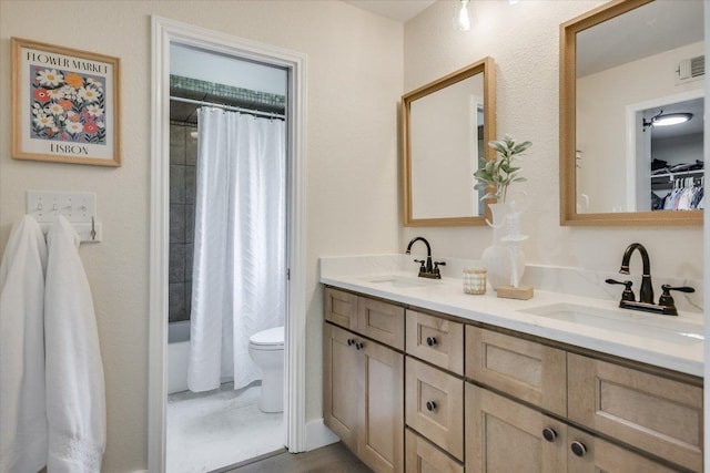 3301 Arrowhead Cir, Round Rock, TX 78681 - full bath with double vanity and shower / bath combo