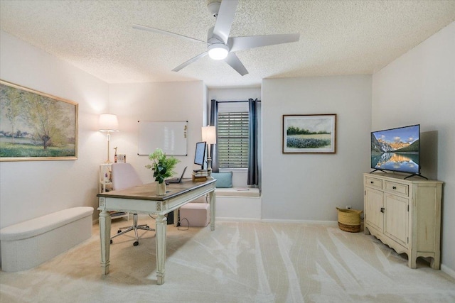 3301 Arrowhead Cir, Round Rock, TX 78681 - office area featuring a textured ceiling, light colored carpet, and a ceiling fan