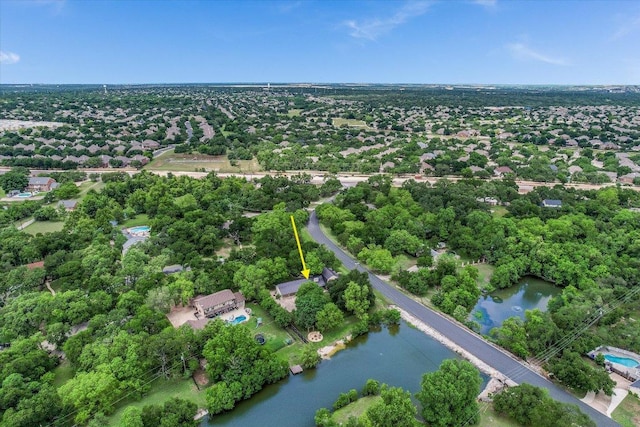 3301 Arrowhead Cir, Round Rock, TX 78681 - aerial overview of property's location featuring a nearby body of water and a tree filled landscape