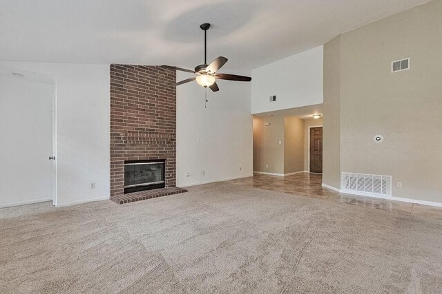 13269 Kerrville Folkway, Austin, TX 78729 - unfurnished living room with ceiling fan, a fireplace, high vaulted ceiling, and carpet floors