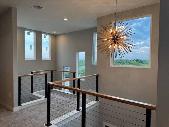 3318 Bay W Blvd, Horseshoe Bay, TX 78657 - corridor with an upstairs landing, a chandelier, recessed lighting, healthy amount of natural light, and baseboards