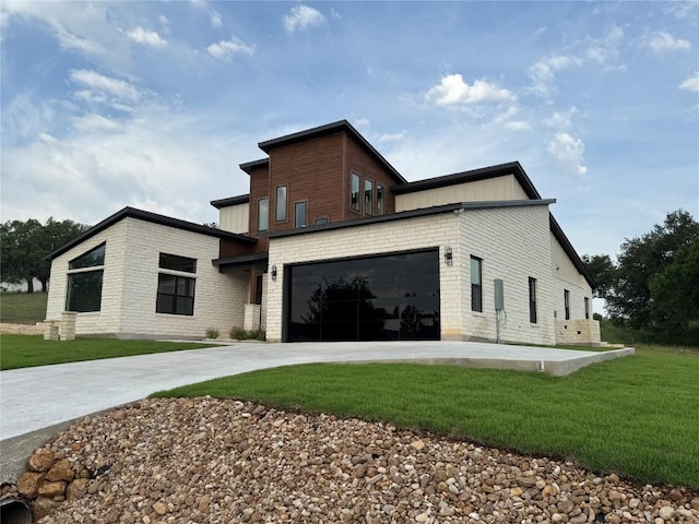 3318 Bay W Blvd, Horseshoe Bay, TX 78657 - view of side of property featuring driveway, a yard, and a garage