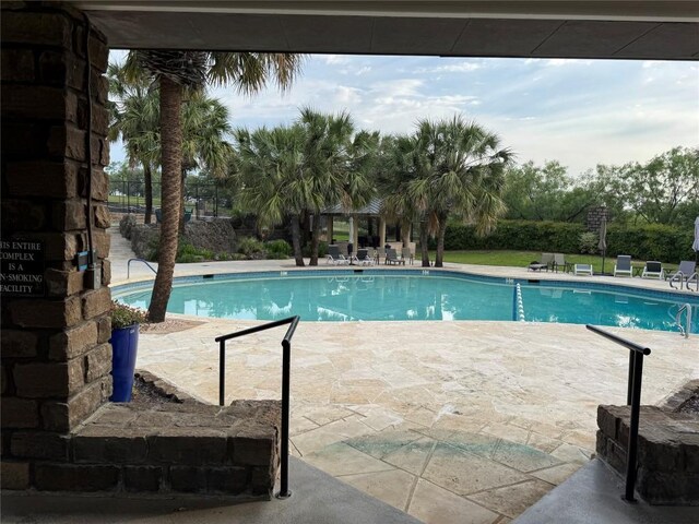 3318 Bay W Blvd, Horseshoe Bay, TX 78657 - community pool with a patio area