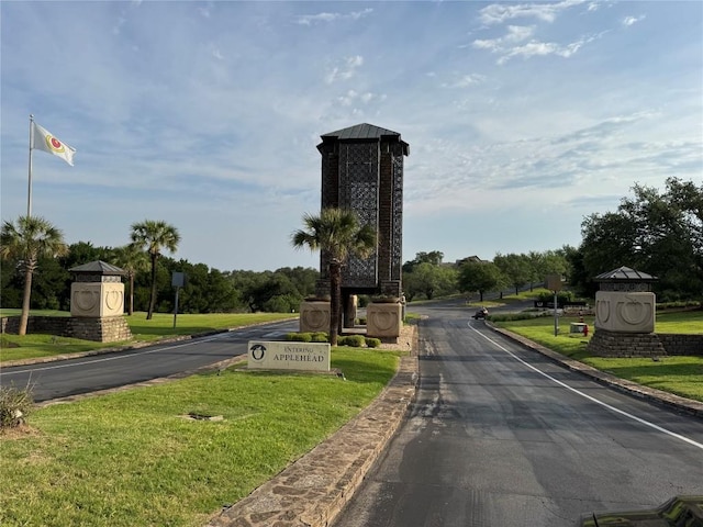 3318 Bay W Blvd, Horseshoe Bay, TX 78657 - view of asphalt road with curbs