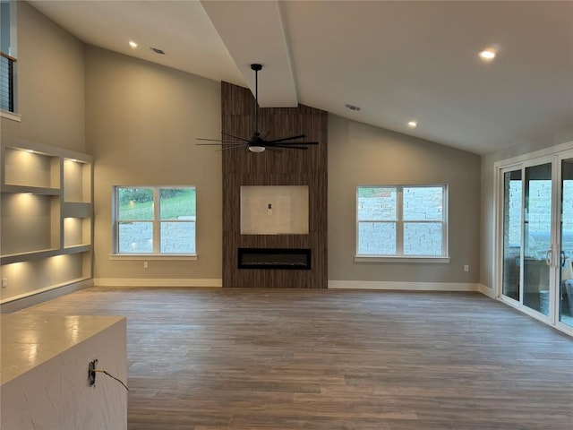 3318 Bay W Blvd, Horseshoe Bay, TX 78657 - unfurnished living room with ceiling fan, wood finished floors, recessed lighting, a fireplace, and baseboards