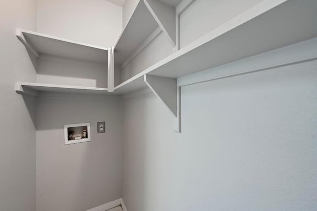 6000 Shepherd Mountain Cv Unit 107, Austin, TX 78730 - washroom featuring washer hookup and baseboards