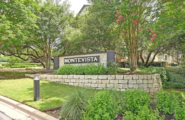 6000 Shepherd Mountain Cv Unit 107, Austin, TX 78730 - community sign featuring a lawn