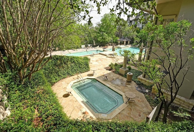 6000 Shepherd Mountain Cv Unit 107, Austin, TX 78730 - community pool featuring a gazebo and a patio