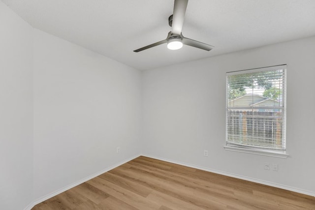 5901 Jacob Gln, Austin, TX 78727 - spare room with light wood-style floors, ceiling fan, and baseboards