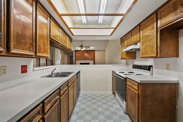 kitchen featuring electric stove, under cabinet range hood, a sink, dishwasher, and light countertops