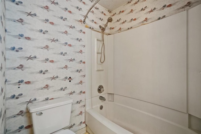 bathroom with toilet and shower / bath combination